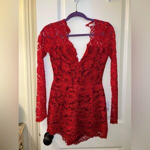 Lovers + Friends red lace longsleeve romper